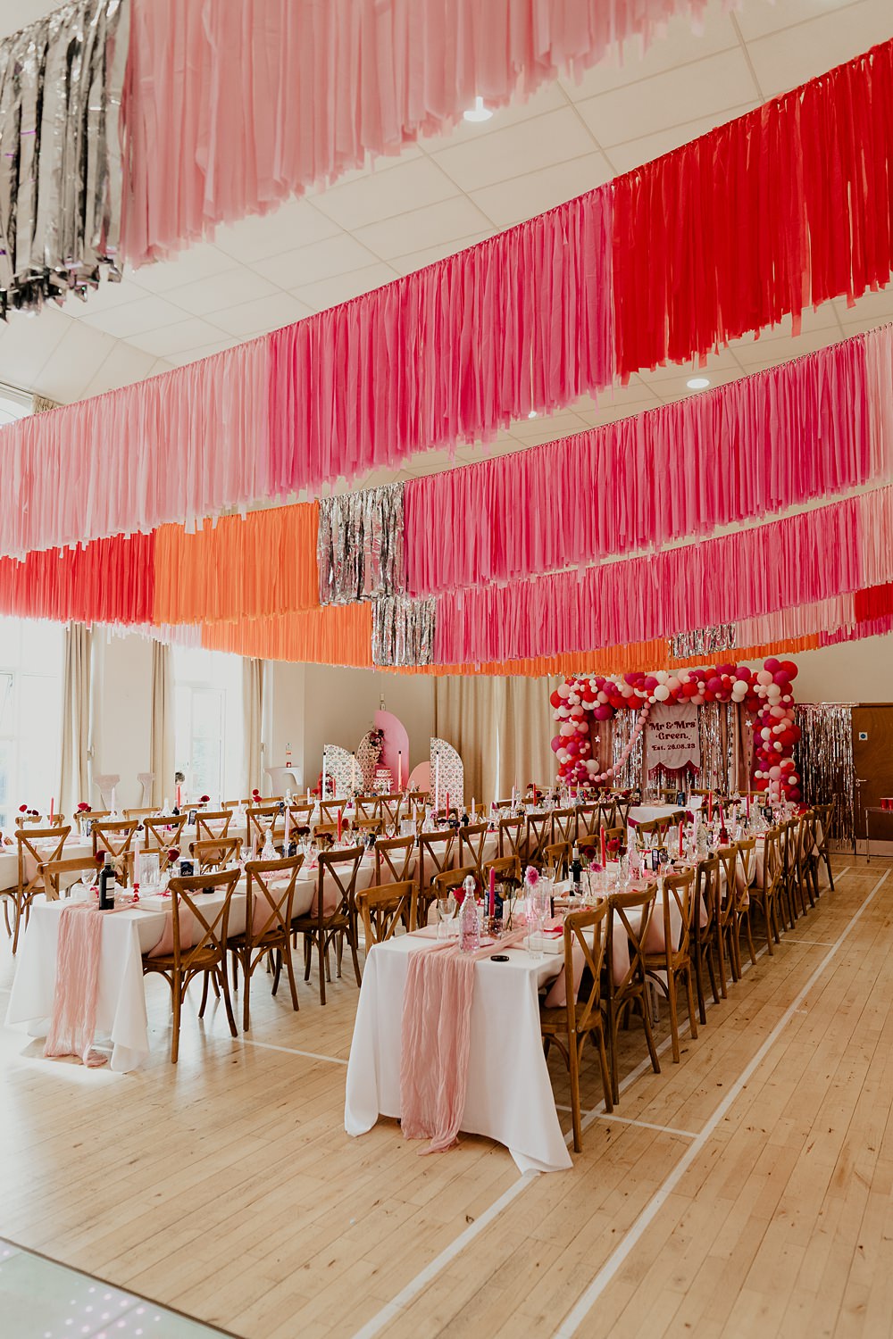 70s Disco Wedding Bubear Photography Village Hall Streamers Decor Pink Red