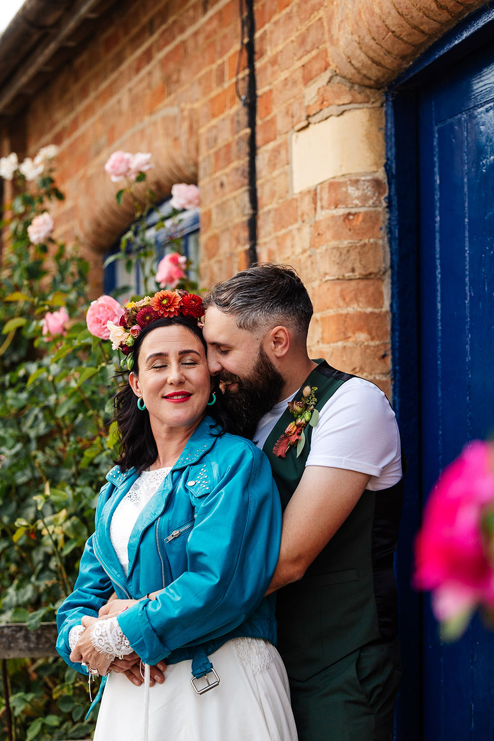 Bassmead Manor Barns Wedding Two-D Photography Blue Vintage Leather Jacket Bride