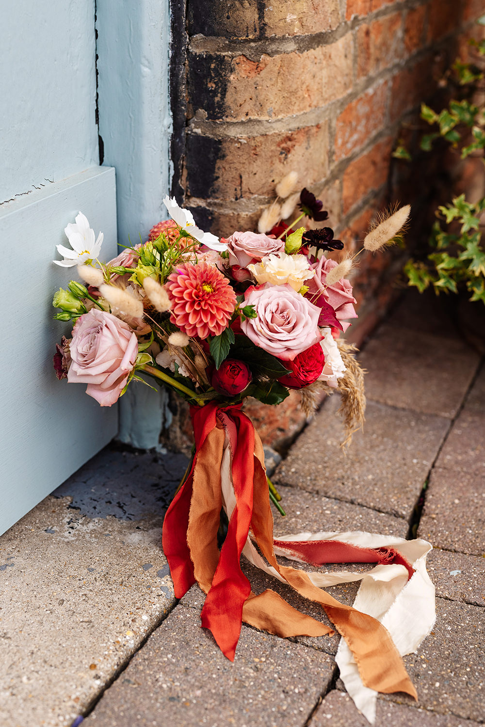 Bassmead Manor Barns Wedding Two-D Photography Colourful Pink Red Bouquet Flowers Ribbons