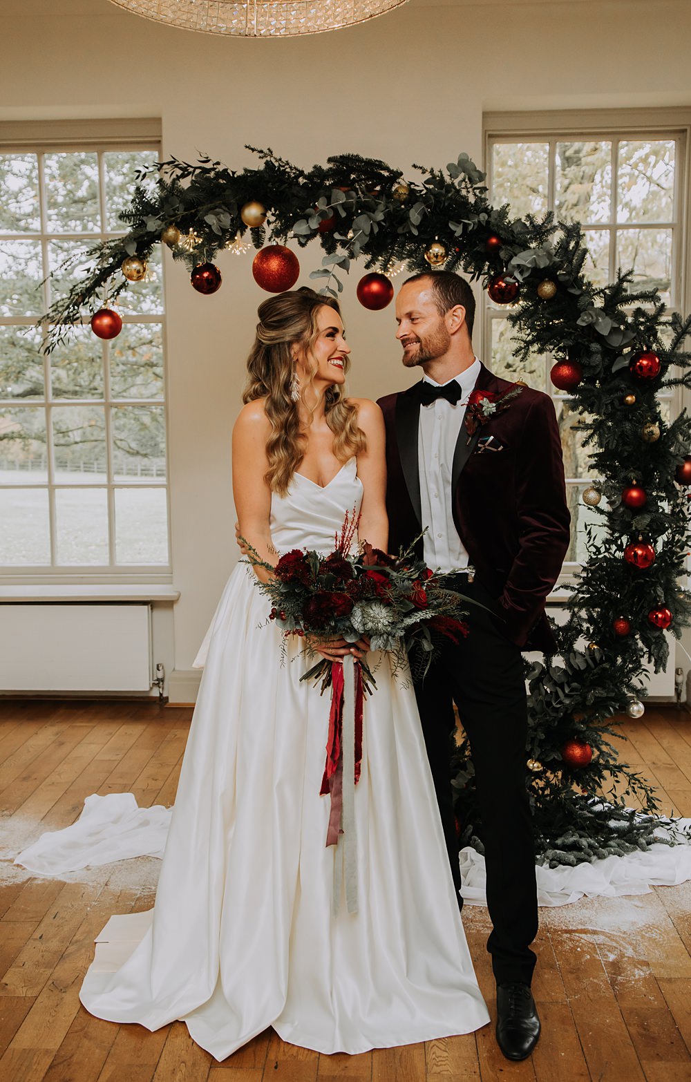 Burgundy Green Christmas Wedding Ideas Charly Mae Photography Crescent Moon Flower Arch Baubles Backdrop