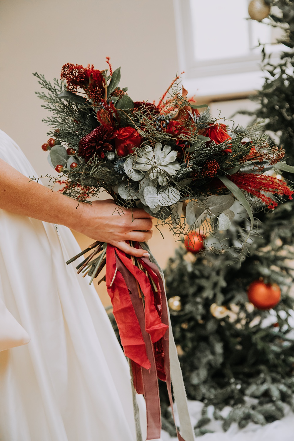 Burgundy Green Christmas Wedding Ideas Charly Mae Photography Red Rose Greenery Bouquet Bridal Ribbons Flowers