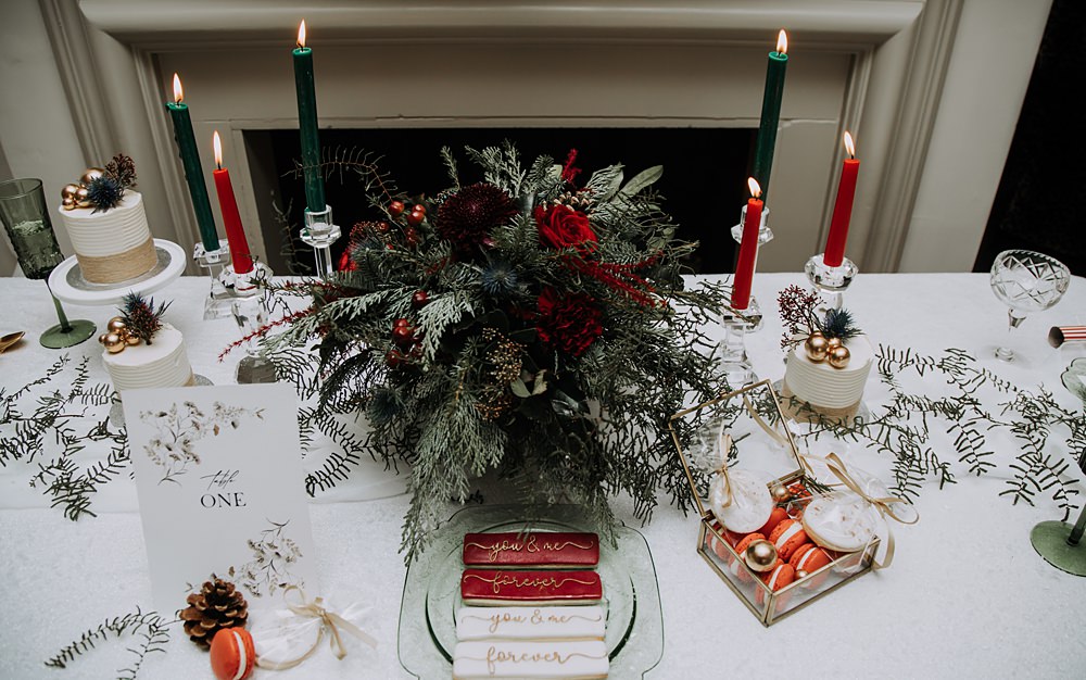 Burgundy Green Christmas Wedding Ideas Charly Mae Photography Table Setting Decor Garland Greenery Tall Candles Centrepiece
