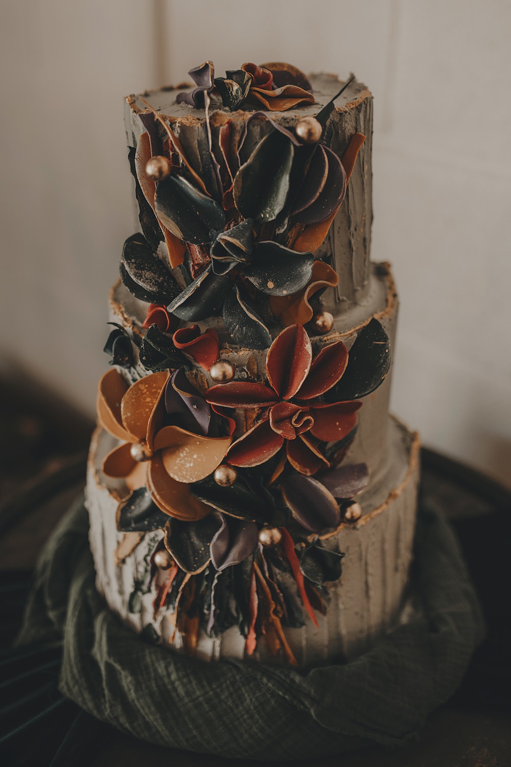 Celestial Witchy Winter Wedding Ideas Aurora Photographic Black Orange Floral Cake Icing