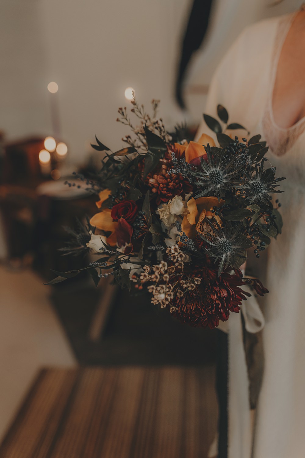 Celestial Witchy Winter Wedding Ideas Aurora Photographic Bride Bouquet Flowers Orange Greenery