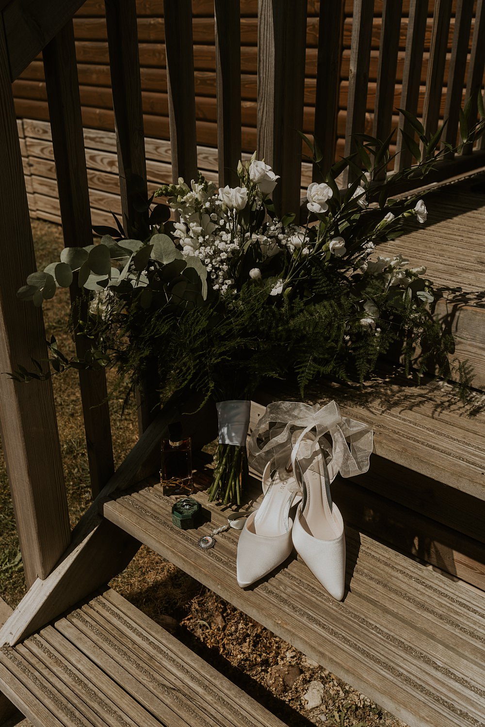 Classic Barn Wedding Firewood Film Greenery Bouquet White Flowers Shoes Bride