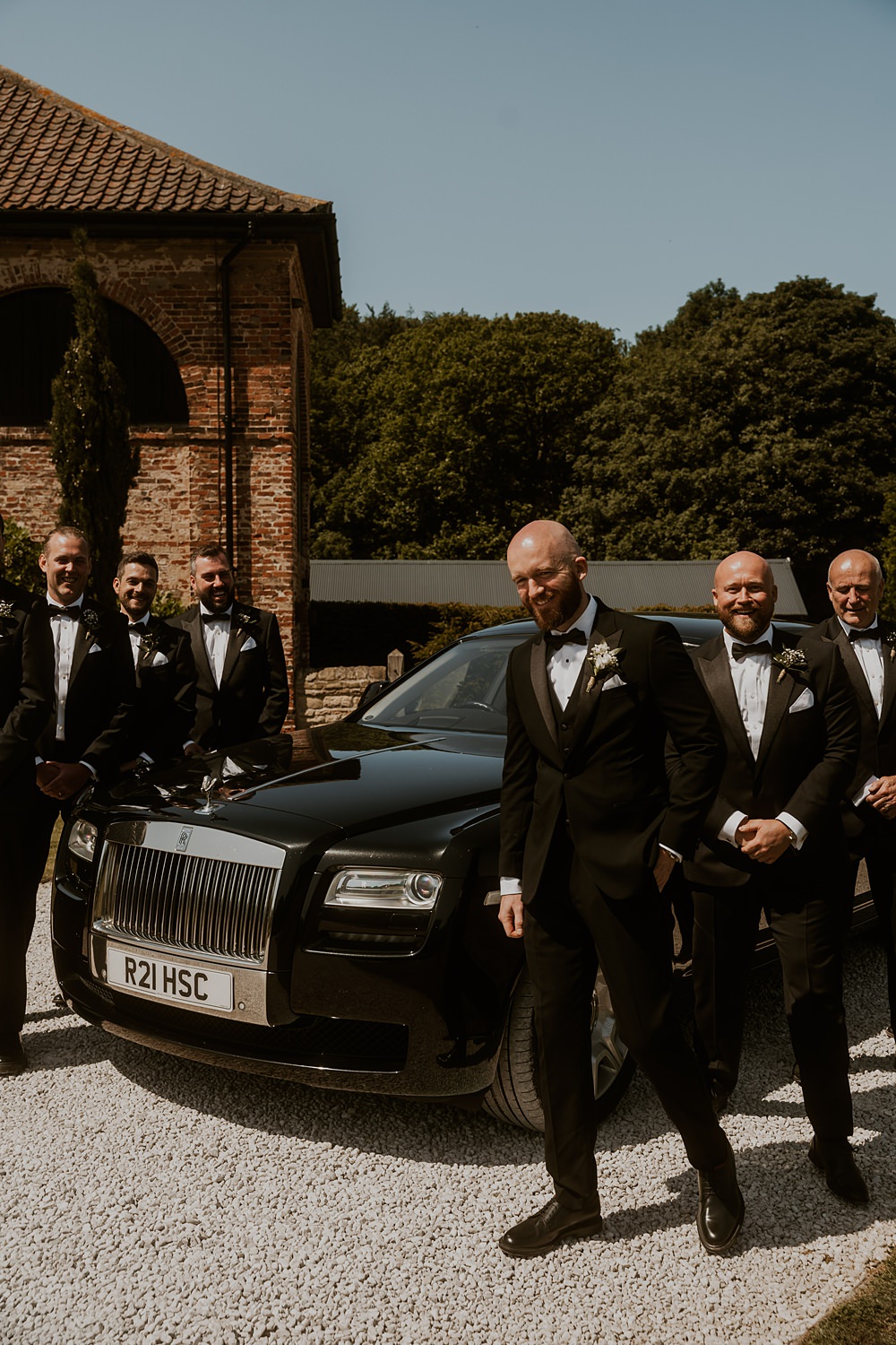 Classic Barn Wedding Firewood Film Groomsmen Groom Tuxedo Suits