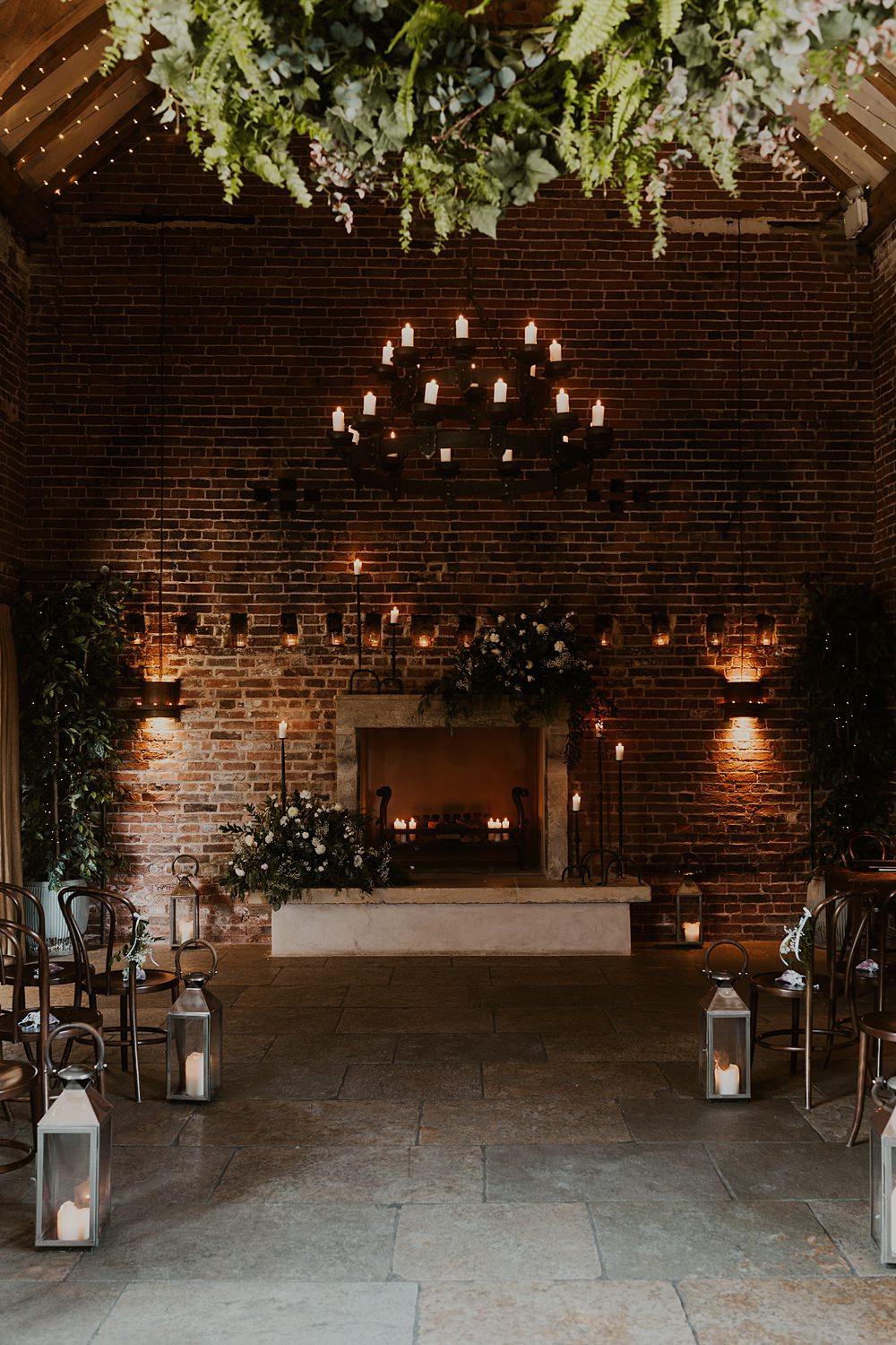 Classic Barn Wedding Firewood Film Ceremony Lights Lanterns Candles Greenery Decor