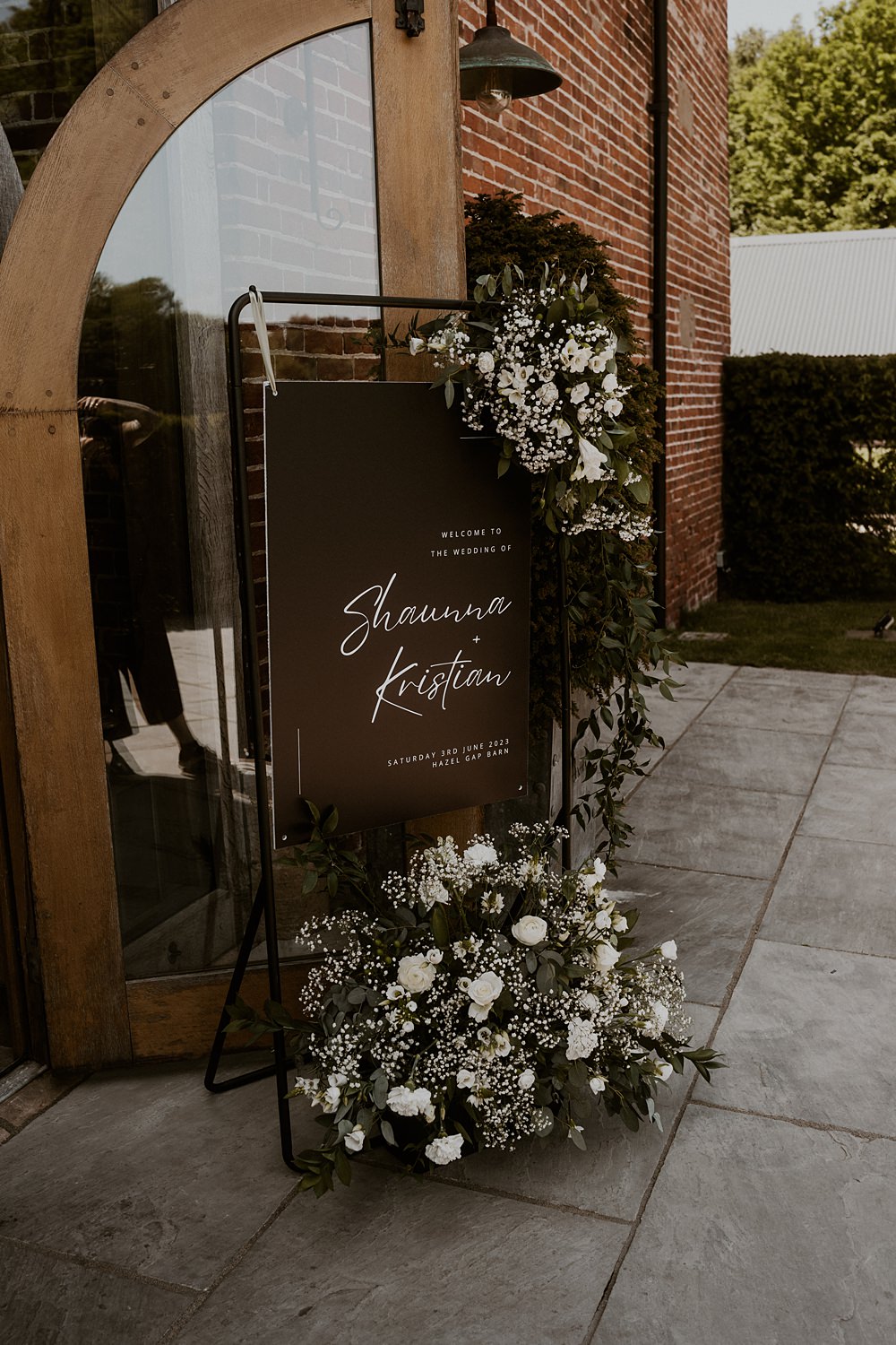 Black White Welcome Sign Greenery Flowers Classic Barn Wedding Firewood Film