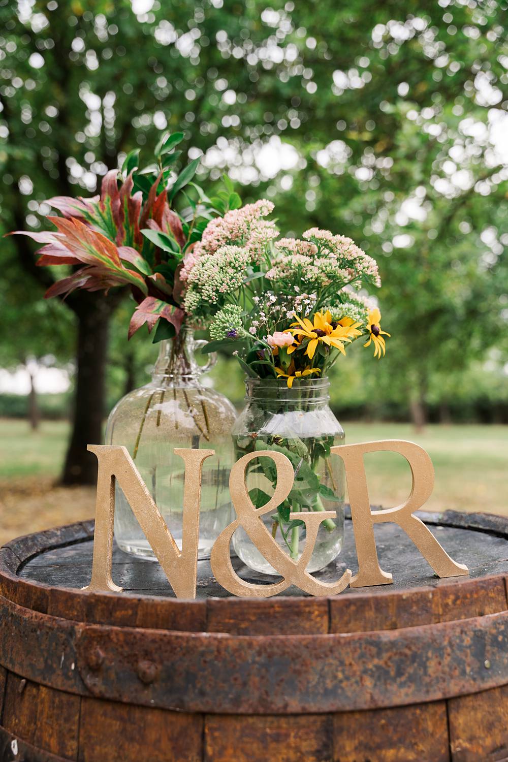 Orchard Wedding Just James Weddings Flowers Wooden Letter Barrel Decor