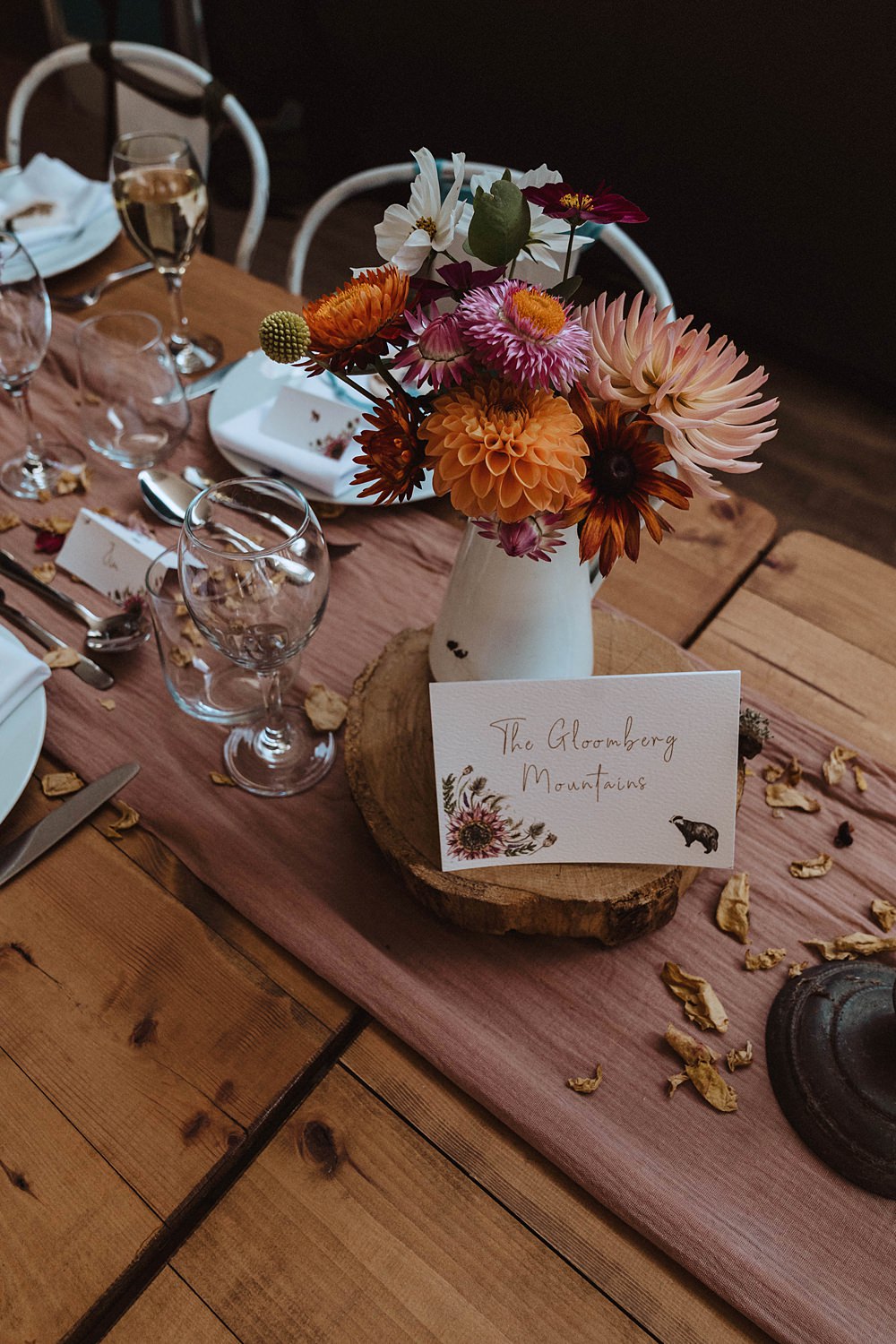 Safari Tent Wedding Indie Love Photography Centrepiece Jug Flowers Sunflower Dahlia Pink Orange Log Slice Table Name Painted
