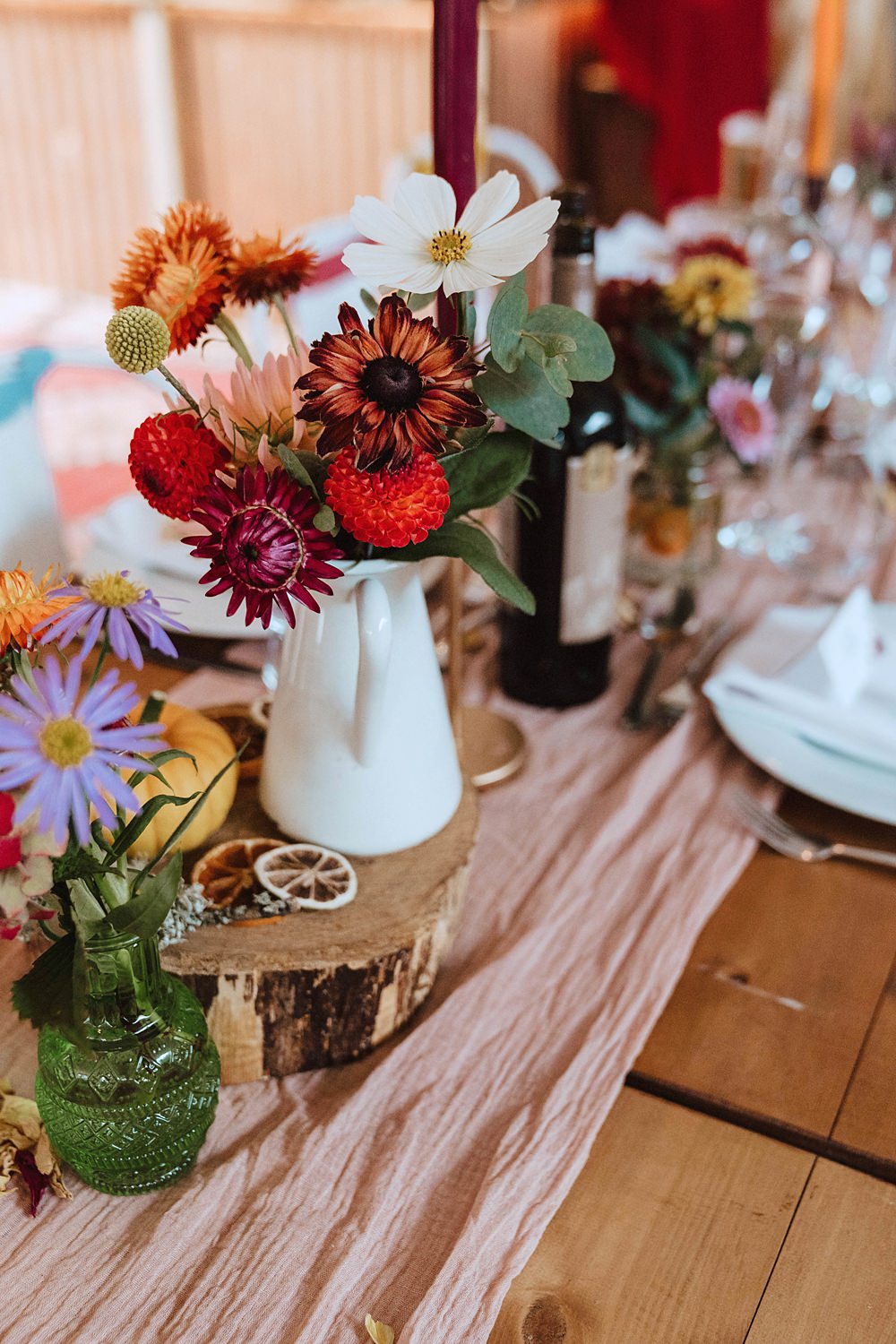 Safari Tent Wedding Indie Love Photography Centrepiece Jug Flowers Sunflower Dahlia Pink Orange Log Slice Table Name Painted