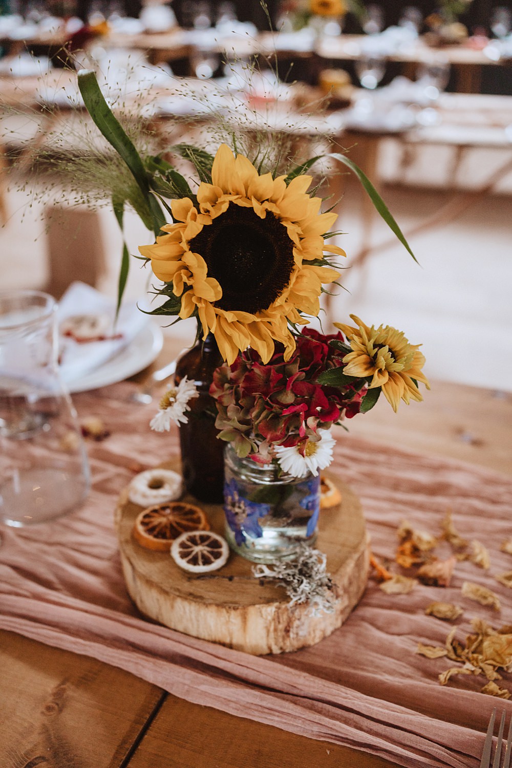 Safari Tent Wedding Indie Love Photography Centrepiece Jug Flowers Sunflower Dahlia Pink Orange Log Slice Table Name Painted