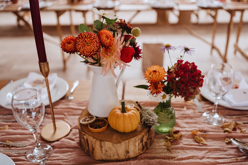 Safari Tent Wedding Indie Love Photography Centrepiece Jug Flowers Sunflower Dahlia Pink Orange Log Slice Table Name Painted Pumpkin