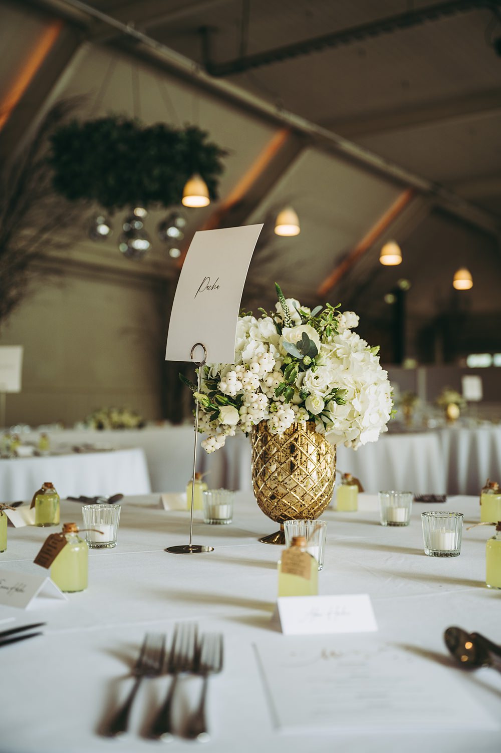 White Gold Wedding Cotswold Pictures Case Flowers Rose Greenery Tea Lights Round Table Centrepiece
