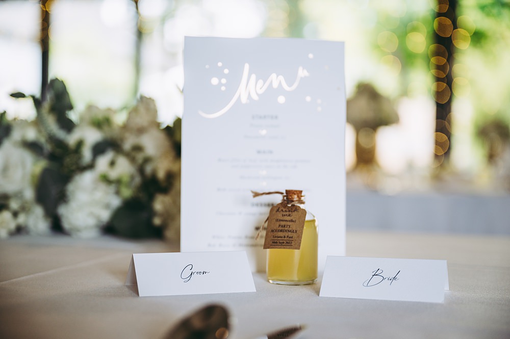 White Gold Wedding Cotswold Pictures Place Name Card Calligraphy Mini Bottle Favour