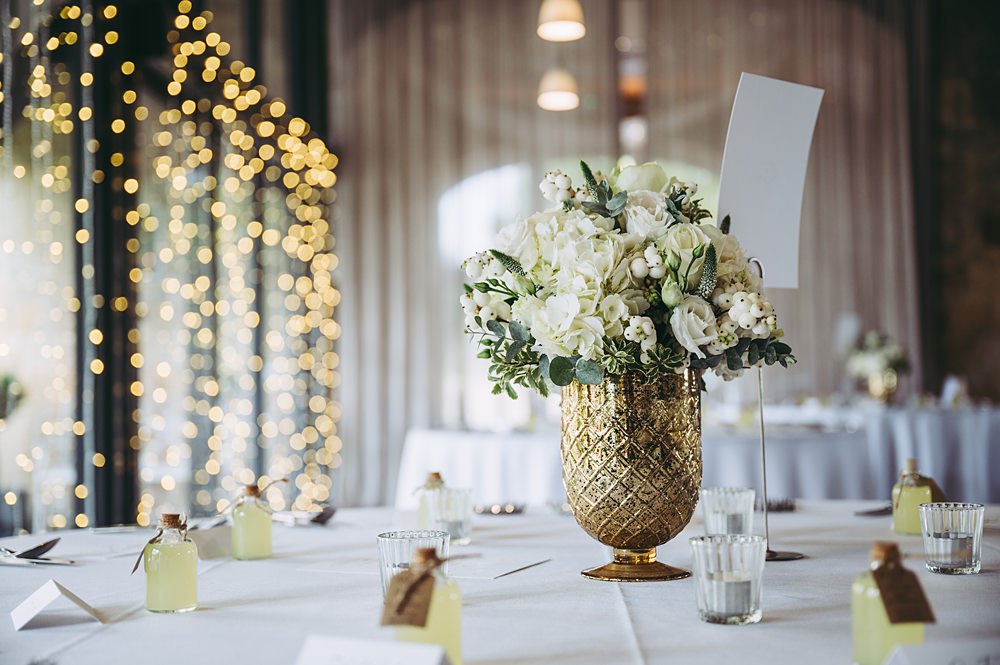 White Gold Wedding Cotswold Pictures Flowers Rose Greenery Tea Lights Round Table Centrepiece
