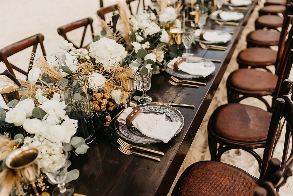 Akiin Tulum Wedding Beach Kape Photography Long Wooden Table White Flowers Pampas Grass Runner Black Candles