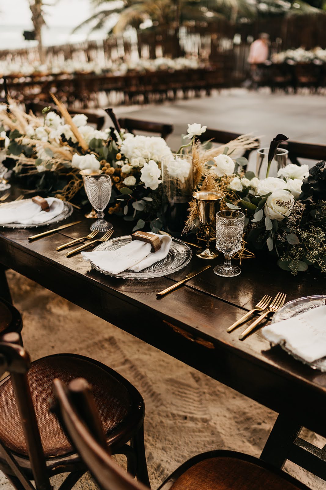 Akiin Tulum Wedding Beach Kape Photography Long Wooden Table White Flowers Pampas Grass Runner Black Candles