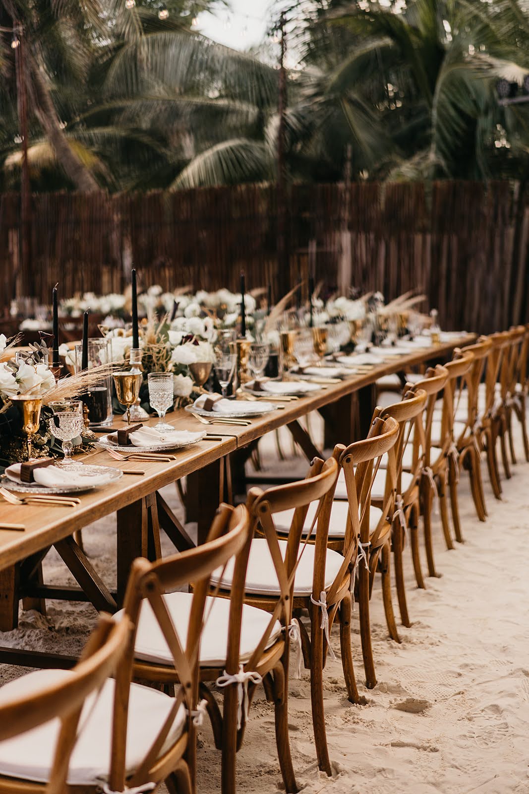 Akiin Tulum Wedding Beach Kape Photography Long Wooden Table White Flowers Pampas Grass Runner Black Candles