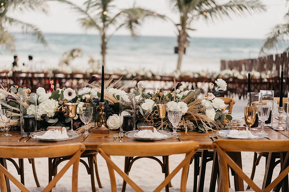 Akiin Tulum Wedding Beach Kape Photography Long Wooden Table White Flowers Pampas Grass Runner Black Candles