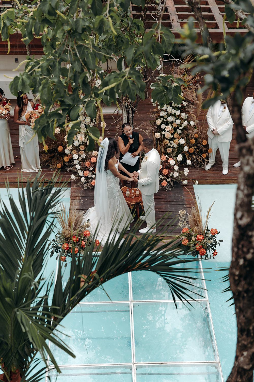 Aldea Ka'an Tulum Wedding Bamba Photography Ceremony Swimming Pool Flower Arch Backdrop