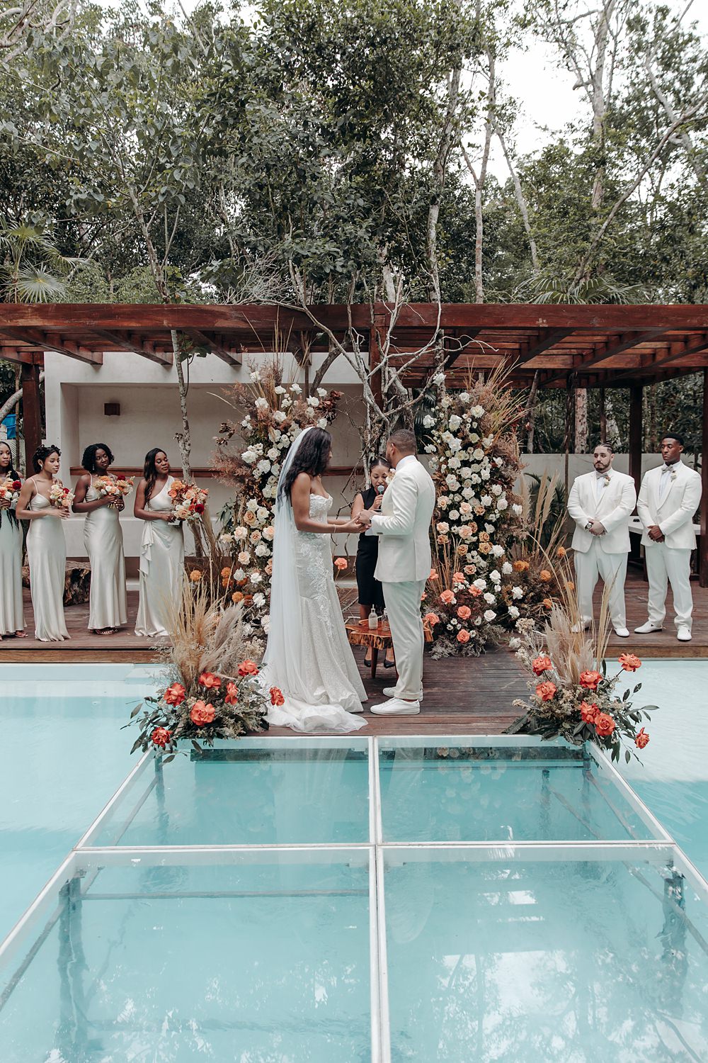 Aldea Ka'an Tulum Wedding Bamba Photography Ceremony Swimming Pool Flower Arch Backdrop