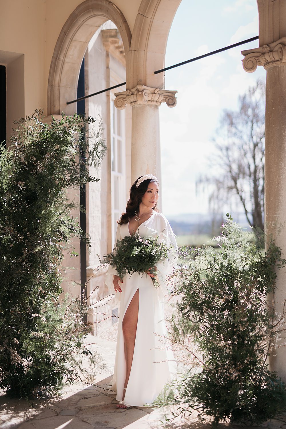Bourton Hall Wedding Ellie Mac Photography Flower Arch Pillars Backdrop Greenery Foliage