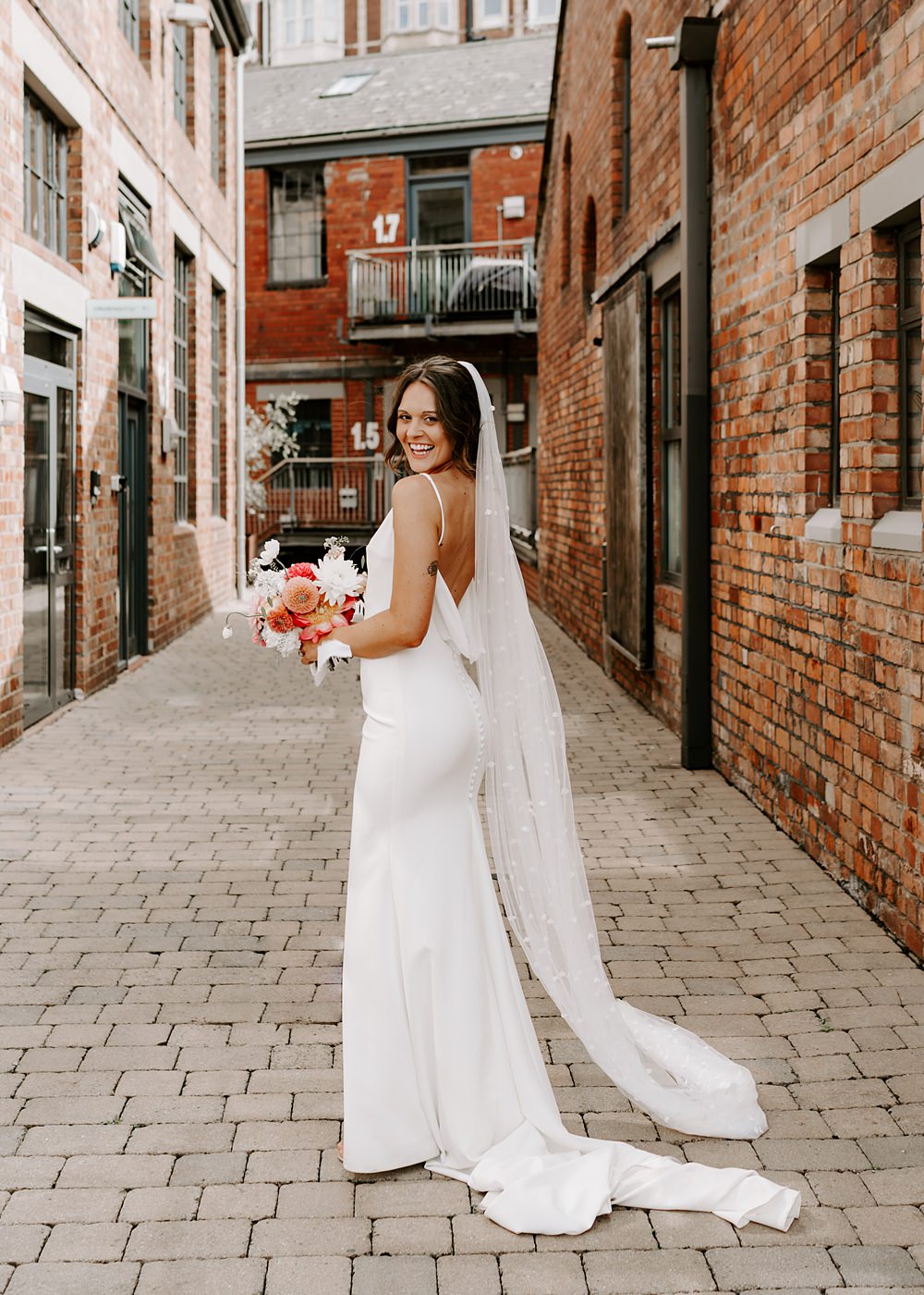 Wedding Ceremony At Home Gina Fernandes Photography Made With Love Bridal Cowl Back Gown