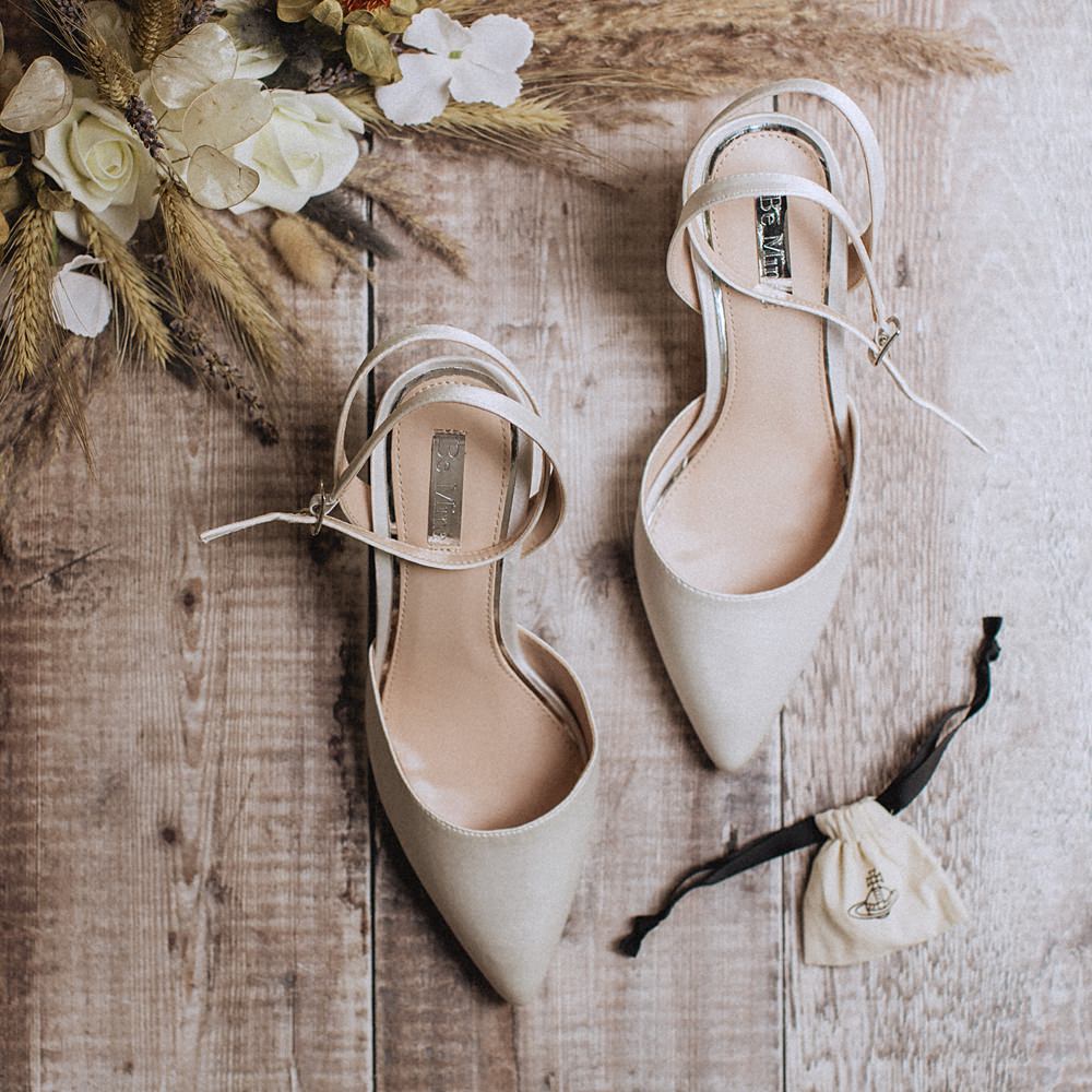 Conwy Barn Wedding Fox and Bear Photography Bride Shoes Flowers