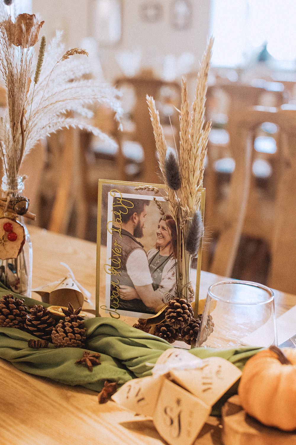 Conwy Barn Wedding Fox and Bear Photography Table Decor Green Runner Pine Cones Pumpkins Autumn