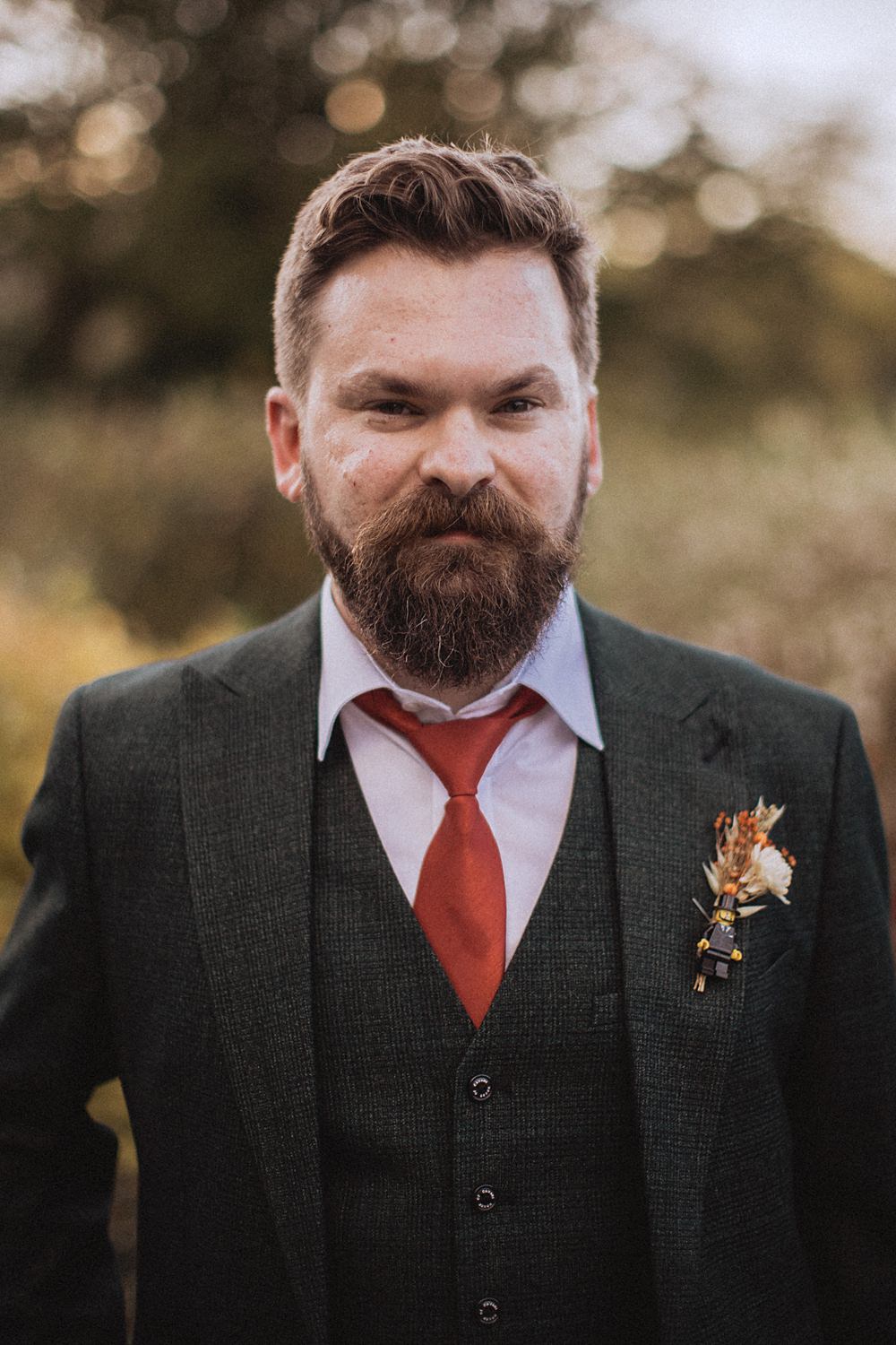 Conwy Barn Wedding Fox and Bear Photography Groom Suit Orange Tie