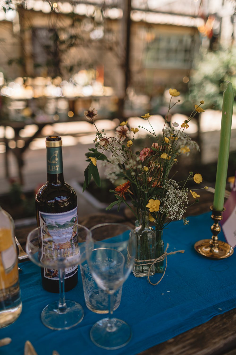 High Paradise Farm Wedding Louise Barry Photographer Wildflowers Centrepiece Blue Linen Table