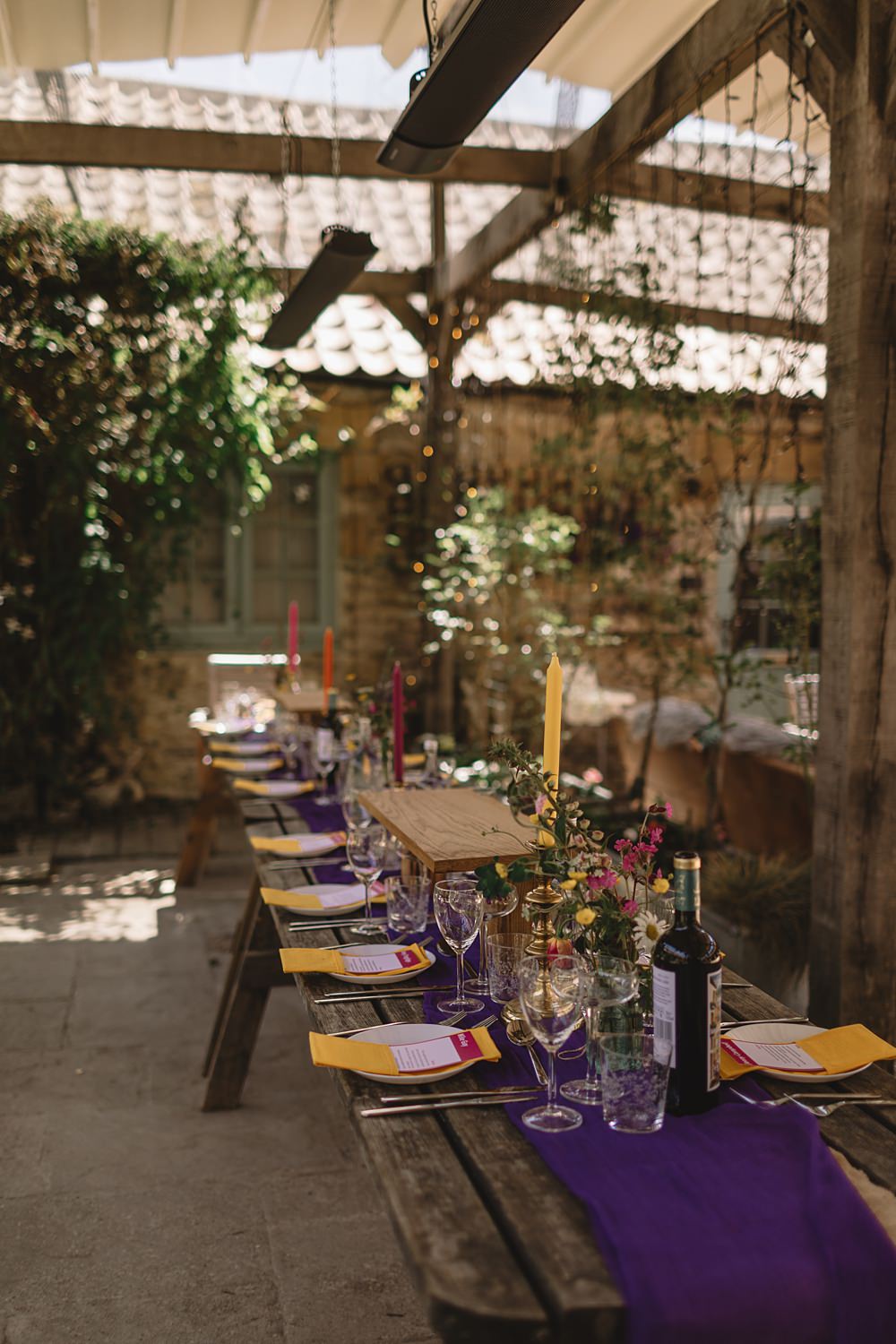 High Paradise Farm Wedding Louise Barry Photographer Yellow Napkins Tall Candles Wildflowers Rustic Wooden Table Decor