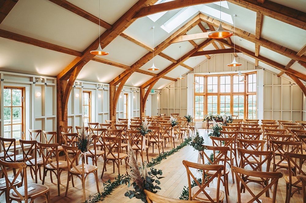 Hyde House Wedding Cotswold Pictures Modern Barn Ceremony Greenery Aisle Flowers Decor