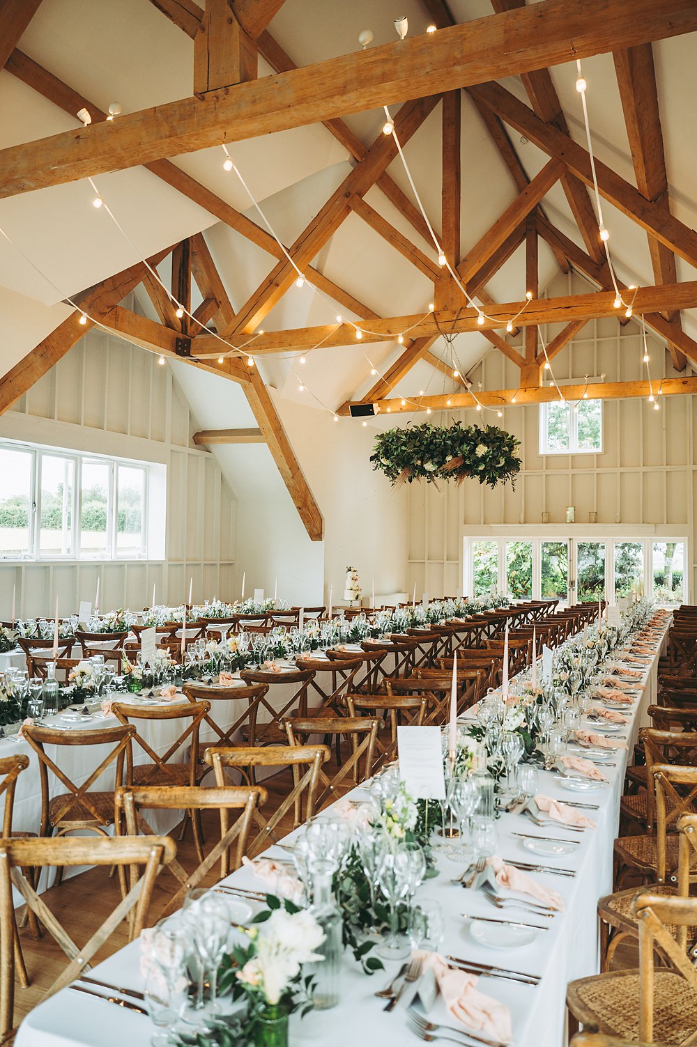 Hyde House Wedding Cotswold Pictures Modern Barn Long Wooden Tables Hanging Greenery Hoop Decor Lighting