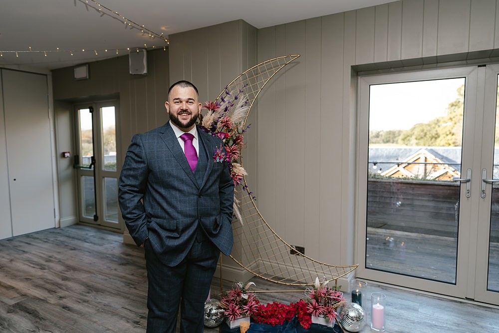 Stables at Ffolkes Wedding Cherrelle Blake Photography Groom Navy Suit Pink Tie