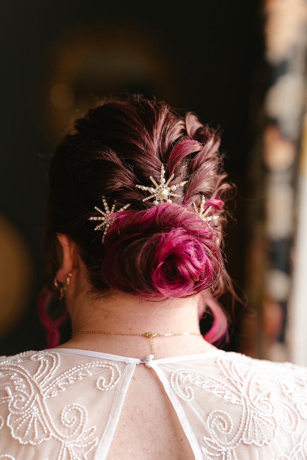 Stables at Ffolkes Wedding Cherrelle Blake Photography Bride Hairstyle Chignon Pink Star Accessories