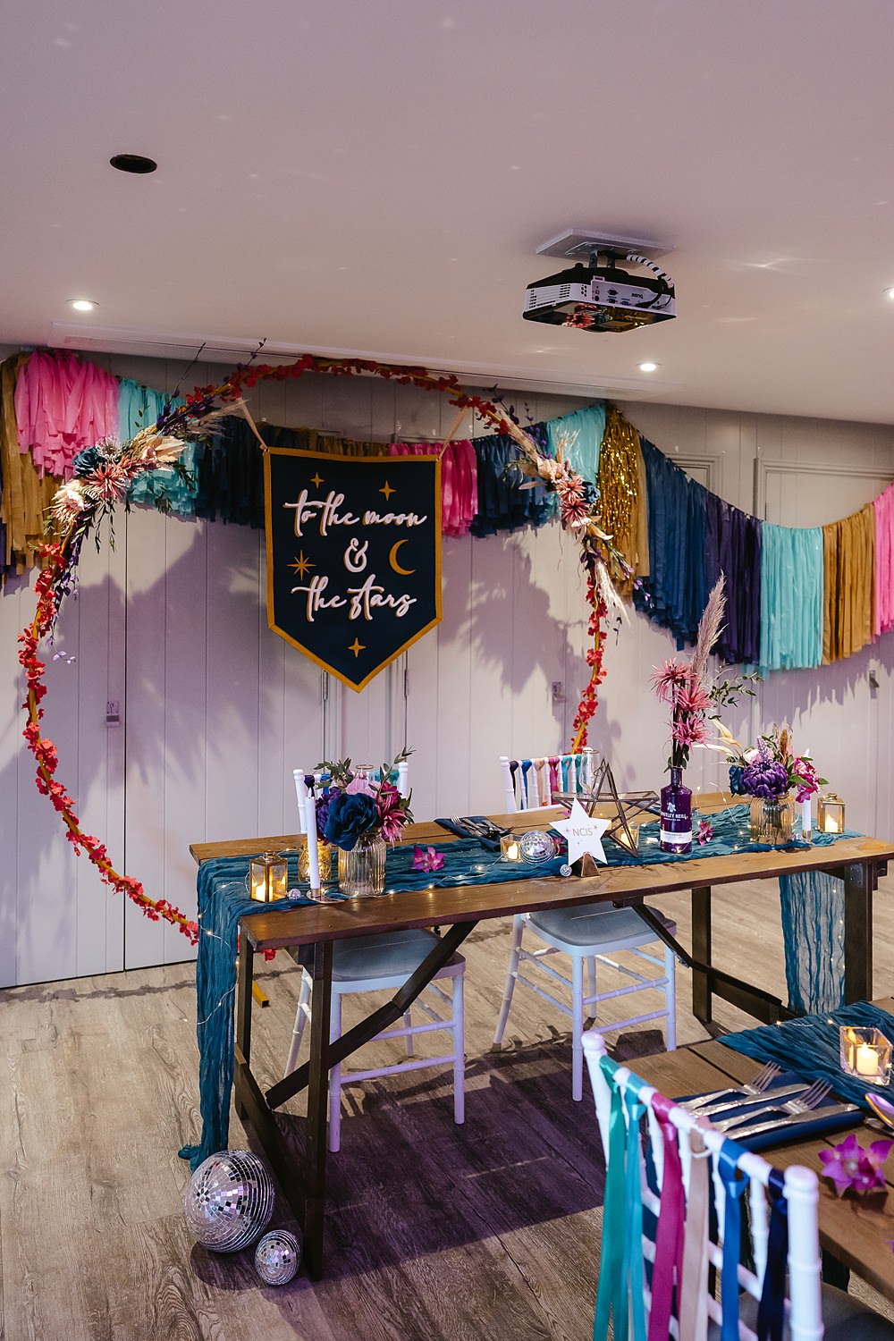 Stables at Ffolkes Wedding Cherrelle Blake Photography Top Table Hoop Banner Streamers Backdrop