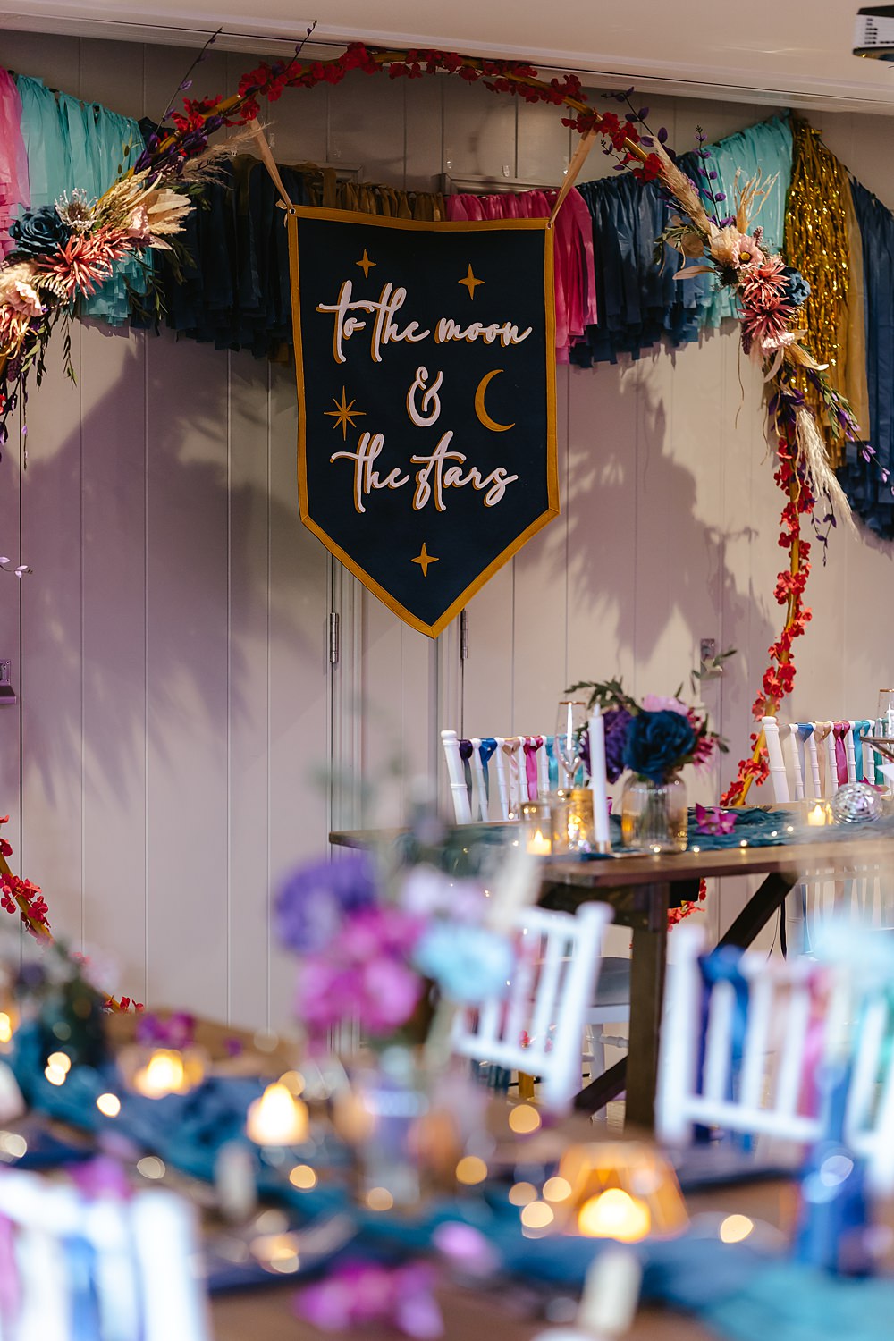 Stables at Ffolkes Wedding Cherrelle Blake Photography Top Table Hoop Banner Streamers Backdrop