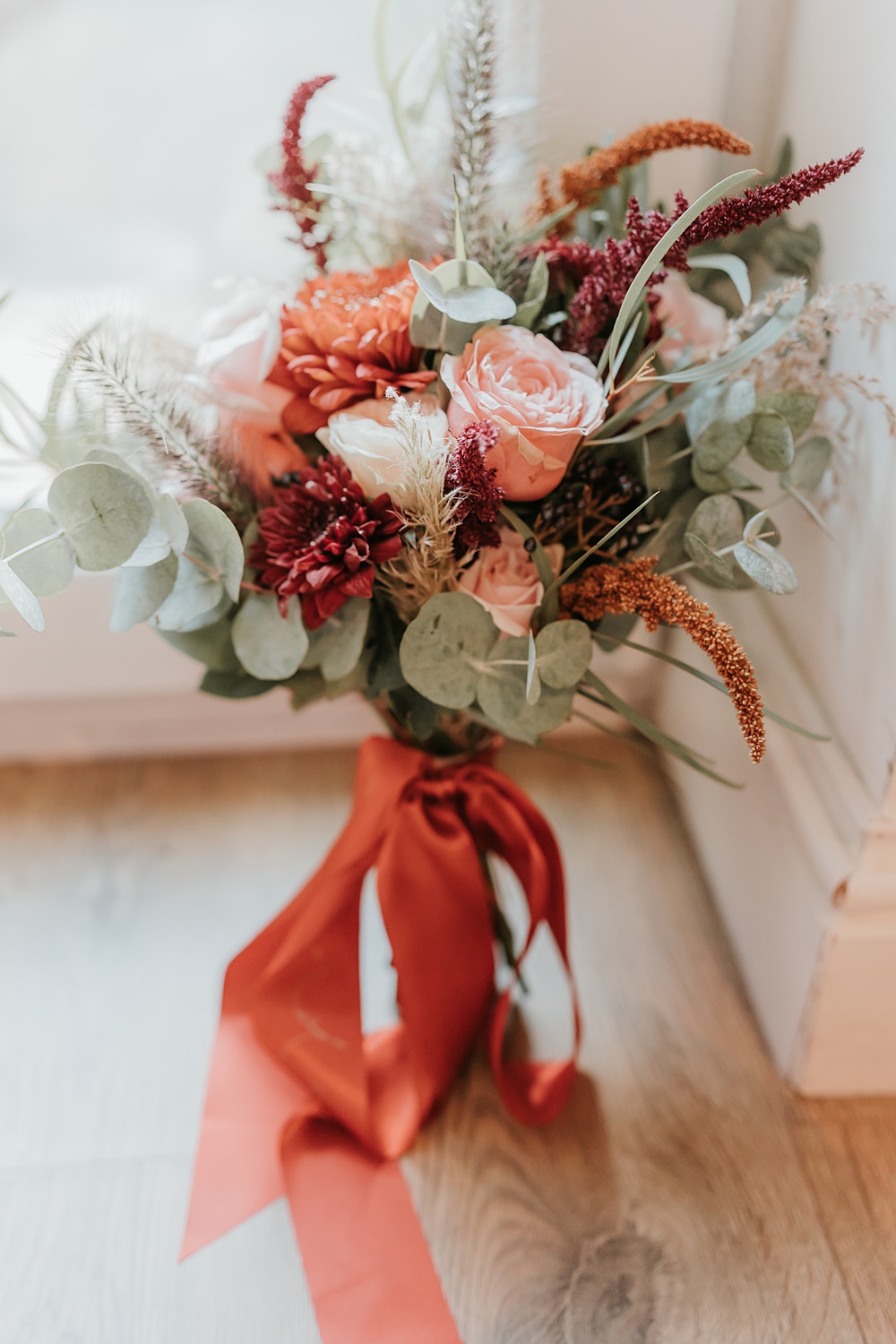 The Oystercatcher Wedding B Photography Bouquet Flowers Bride Orange Pink Ribbon