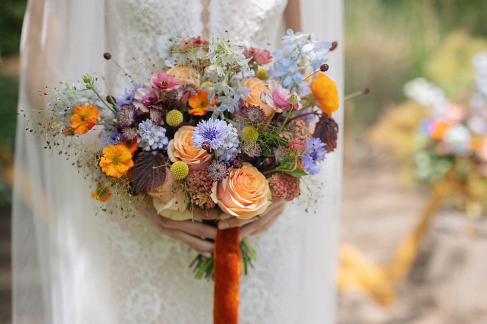 Weddings At Woodfords Max Turner Weddings Colourful Wild Flower Bouquet Bridal Orange Blue