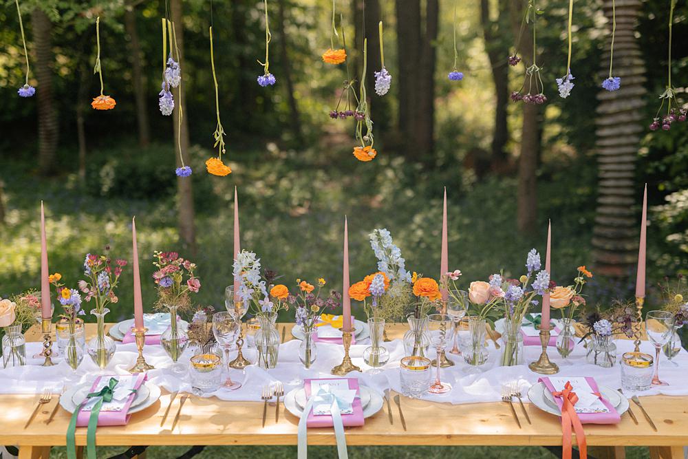 Weddings At Woodfords Max Turner Weddings Wooden Table Colourful Wildflowers Flower Bottles Tall Candles Gold Decor