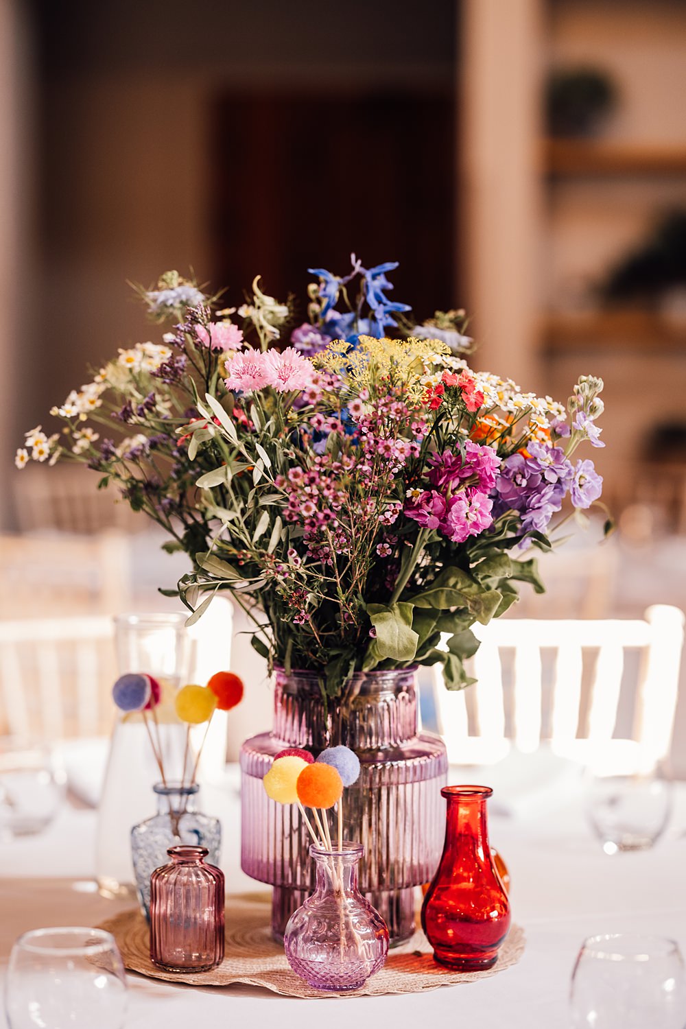 Cool Colourful Wedding Amy Elizabeth Photo Centrepiece Flowers Decor Pom Poms Coloured Glass