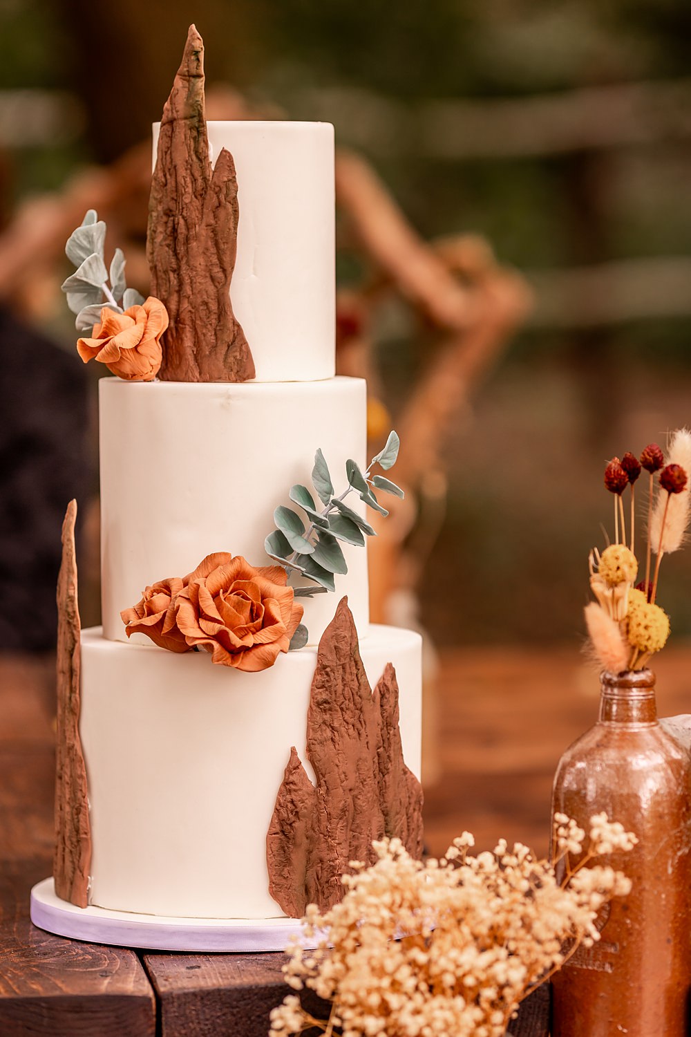 Lilibet Wood Wedding Hannah Betts Photography 3 Tier White Iced Cake Bark Flowers