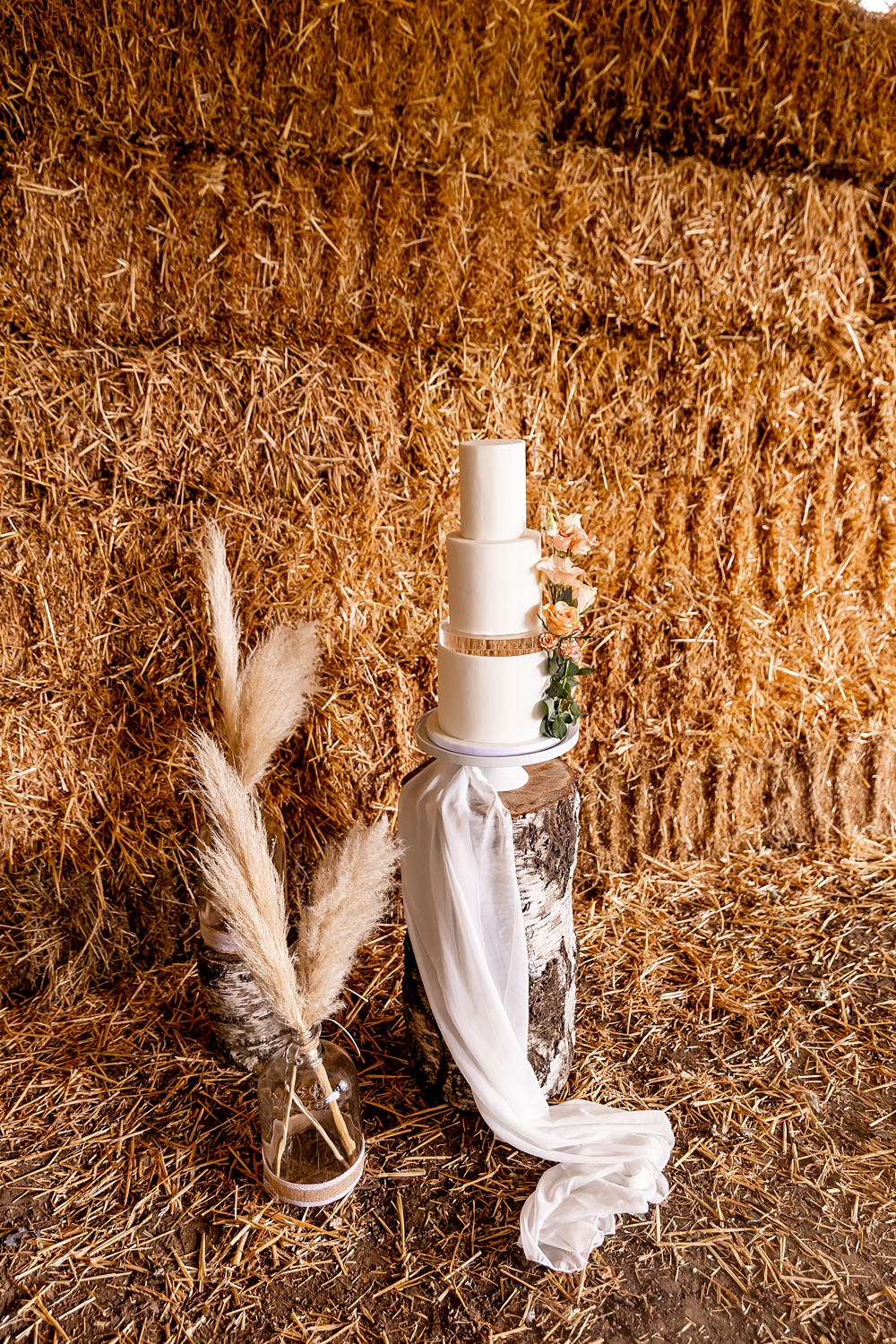 Lilibet Wood Wedding Hannah Betts Photography 3 Tier Cake White Ribbon Flowers Table