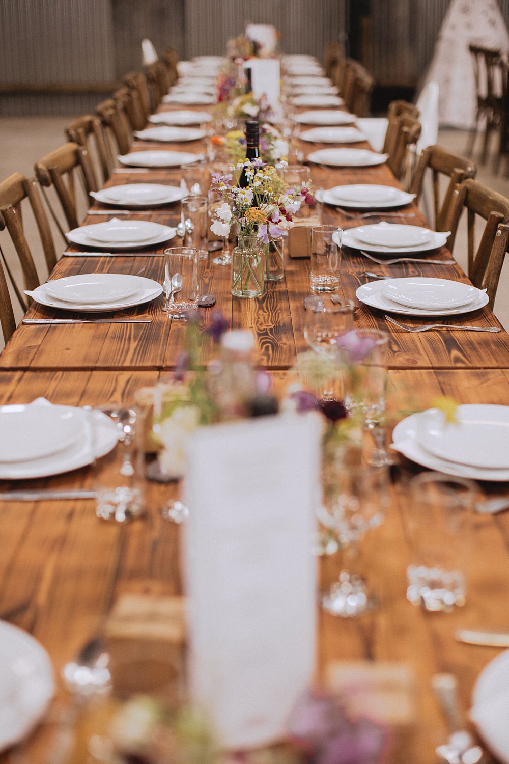 Long Wooden Table Barn Colourful Flowers Pen Y Fron Wedding Fox and Bear Photography
