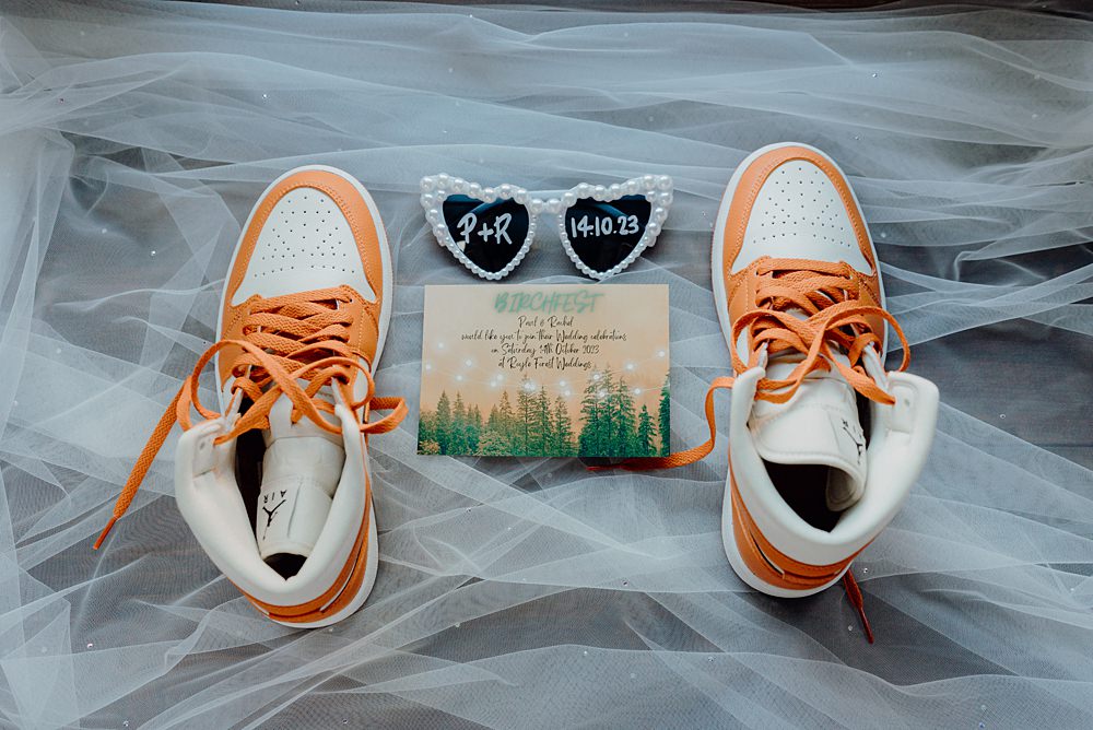 Royle Forest Wedding Bligh and Guy Wedding Visuals Bridal Trainers Sunglasses Invite