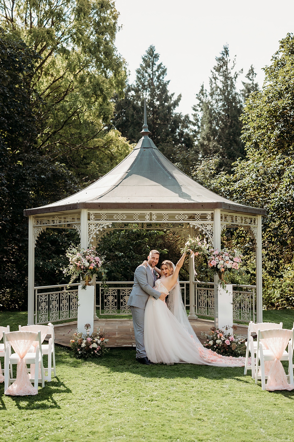 Summer Blush Wedding NK Photography Ceremony Gazebo Pink White Flowers Outdoor