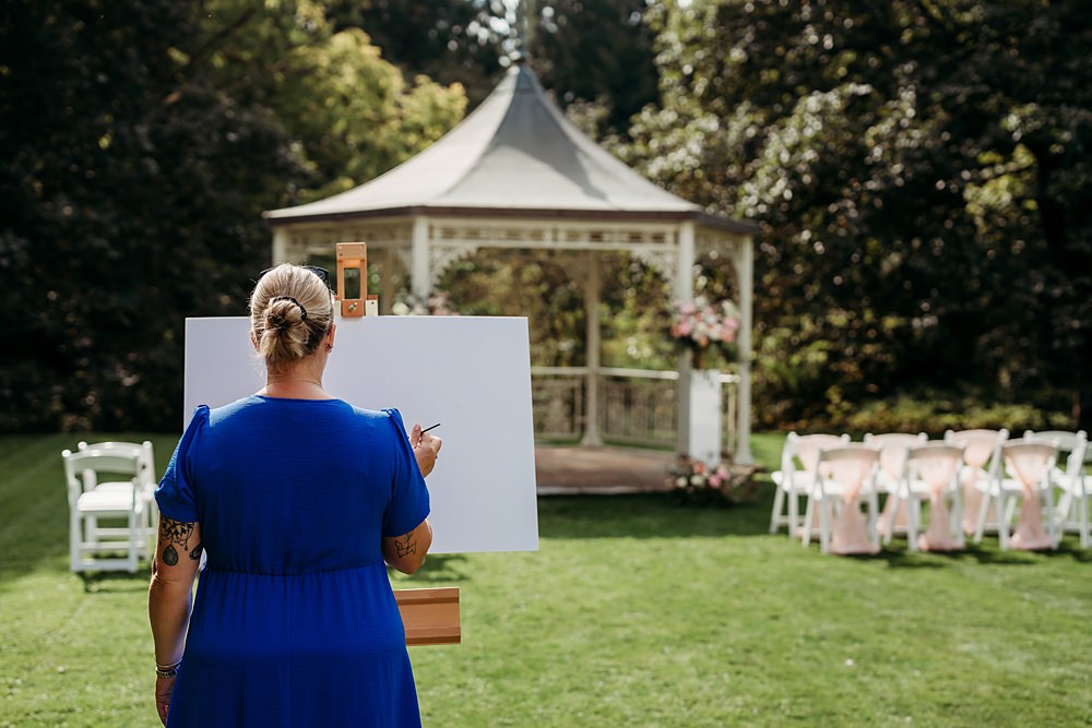 Summer Blush Wedding NK Photography Live Painter Ceremony