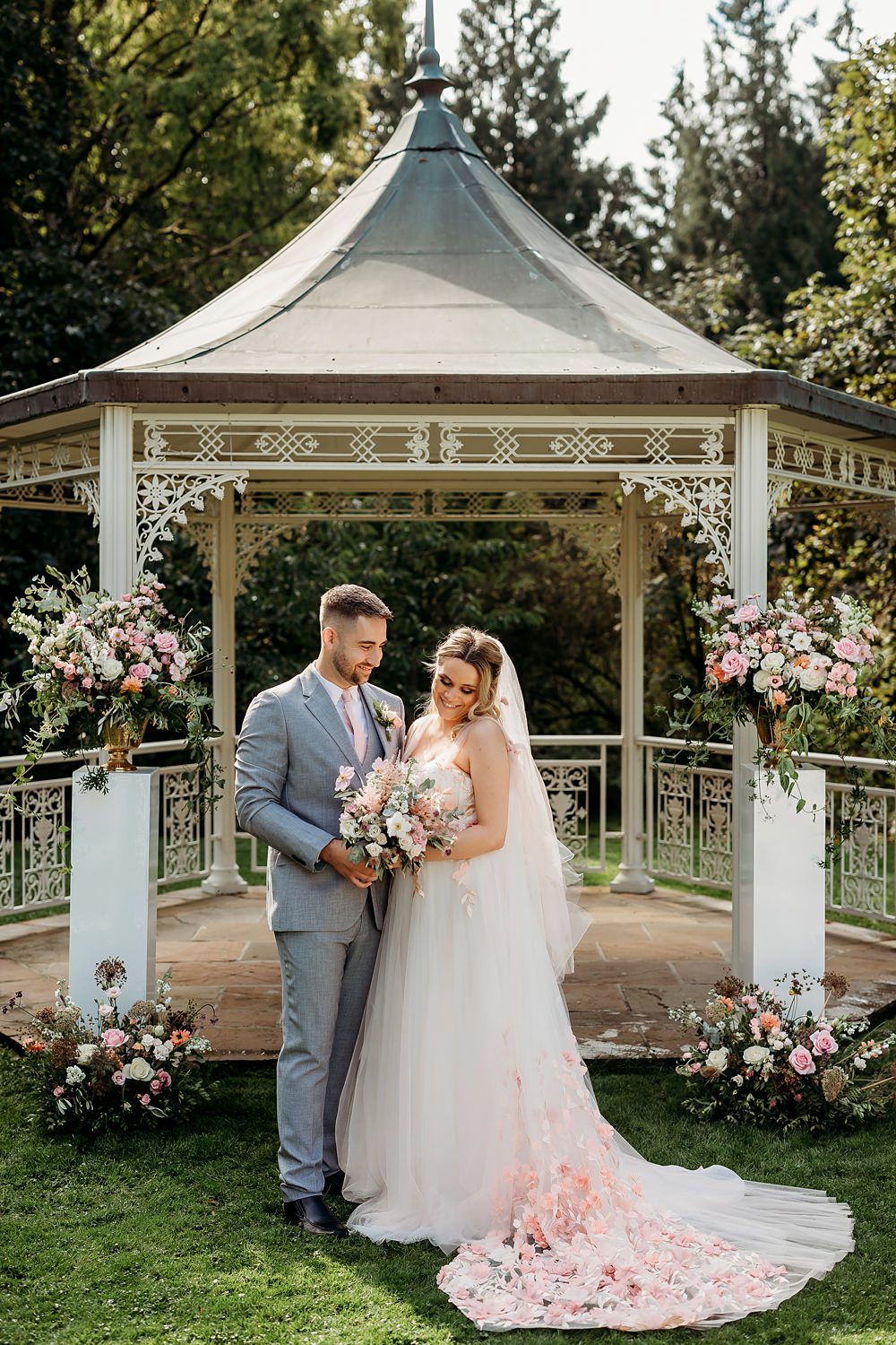 Summer Blush Wedding NK Photography Ceremony Gazebo Pink White Flowers Outdoor